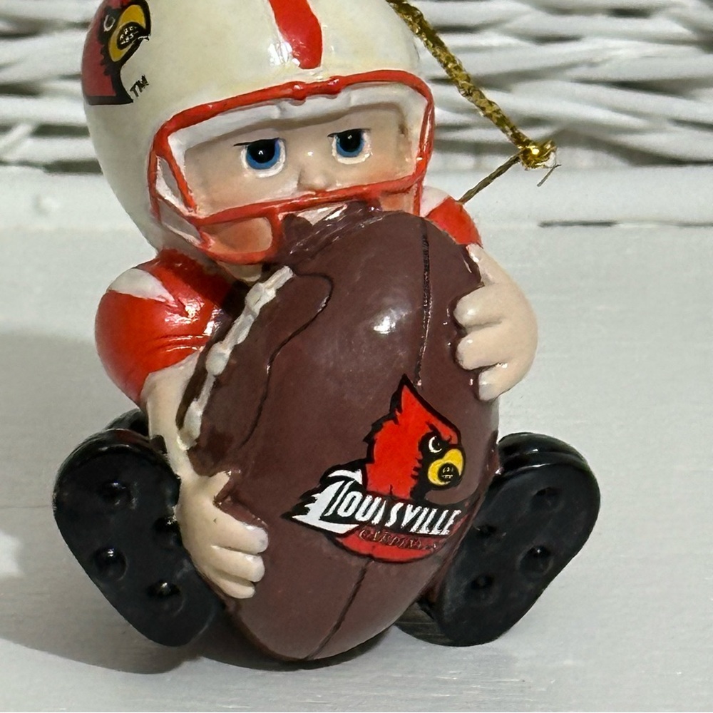 Vintage Louisville Cardinals Football Player Ornament Hugging Ball Resin